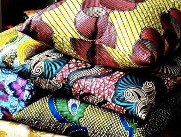 Rustic interior design - yellow toned tribal printed cushions