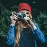 Hipster holding camera