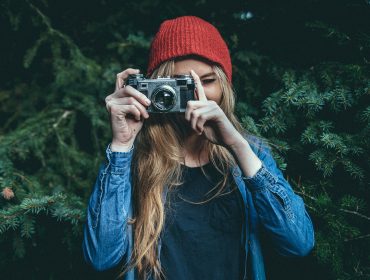 Hipster holding camera