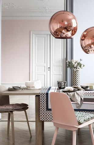 Rose gold and pink dining room with patterns