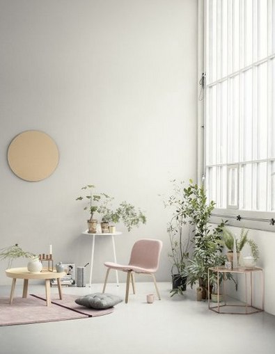 Blush pink furnishings in large white warehouse