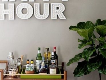 Contemporary interior design styles - wooden bar cart with sign