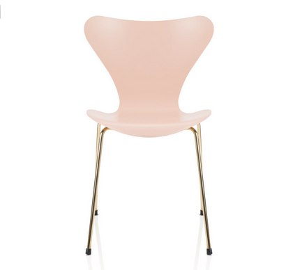 Modern pink chair with rose gold curved legs