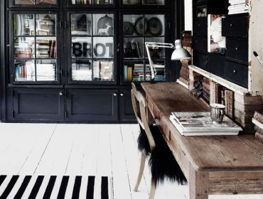 Office interior design - rustic desk with white floorboards