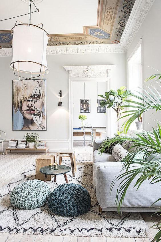 living room with greenery and artwork