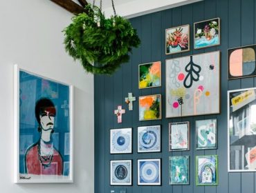 Contemporary interior design styles - feature wall with colourful art