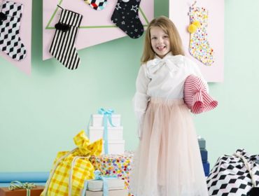 Home interior styles - little girl with Santa stockings