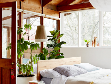 Famous interior designers - natural bedroom with greenery
