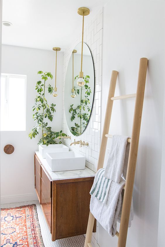 Small bathroom ideas - natural ladder and greenery