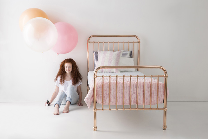 Small bedroom decorating ideas - rose gold kids bed