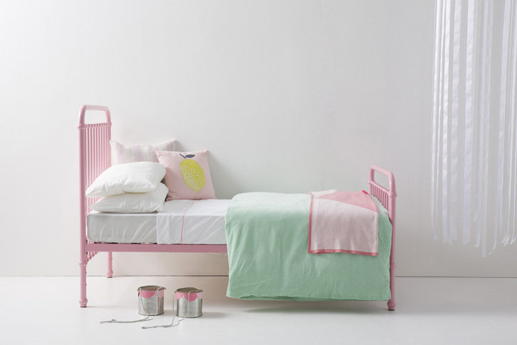 Small bedroom decorating ideas - pink metal bed
