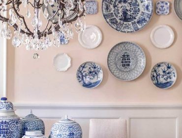 French accent plate gallery wall with chandelier