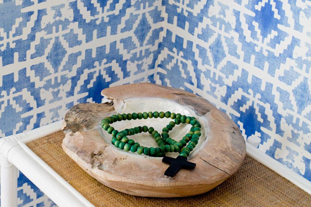 boho coast patterned wall with rosary beads