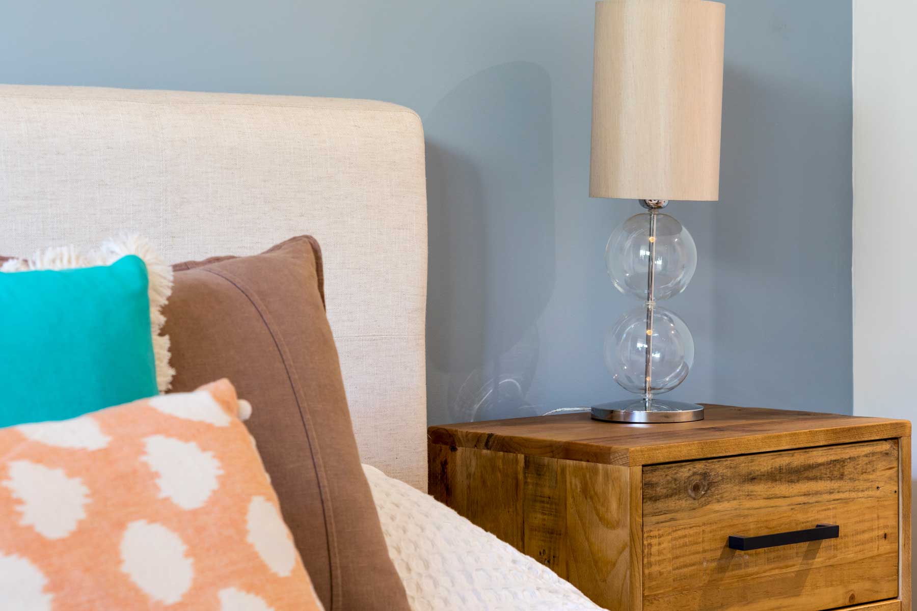 Robyn's vibrant beach apartment - after - bedside 2