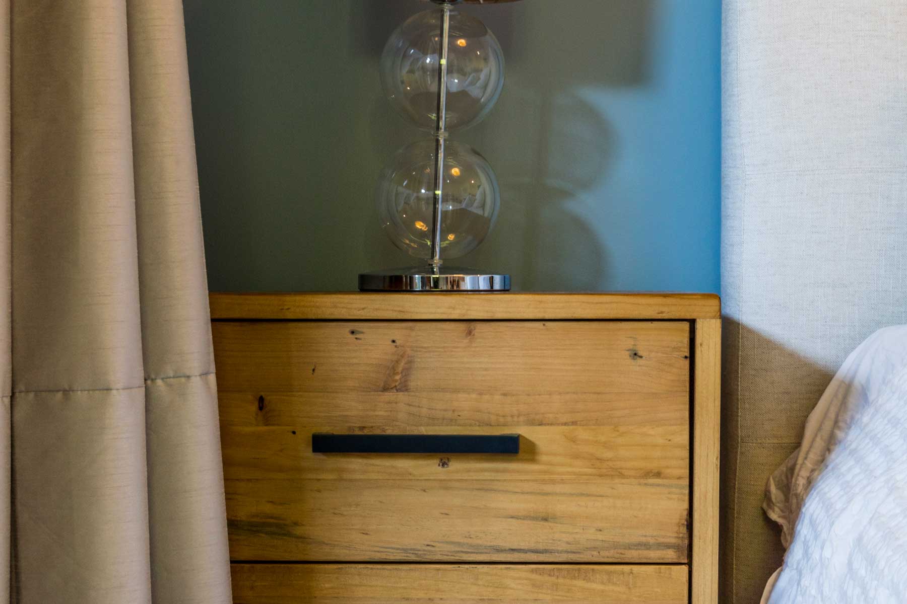 Robyn's vibrant beach apartment - after - bedside