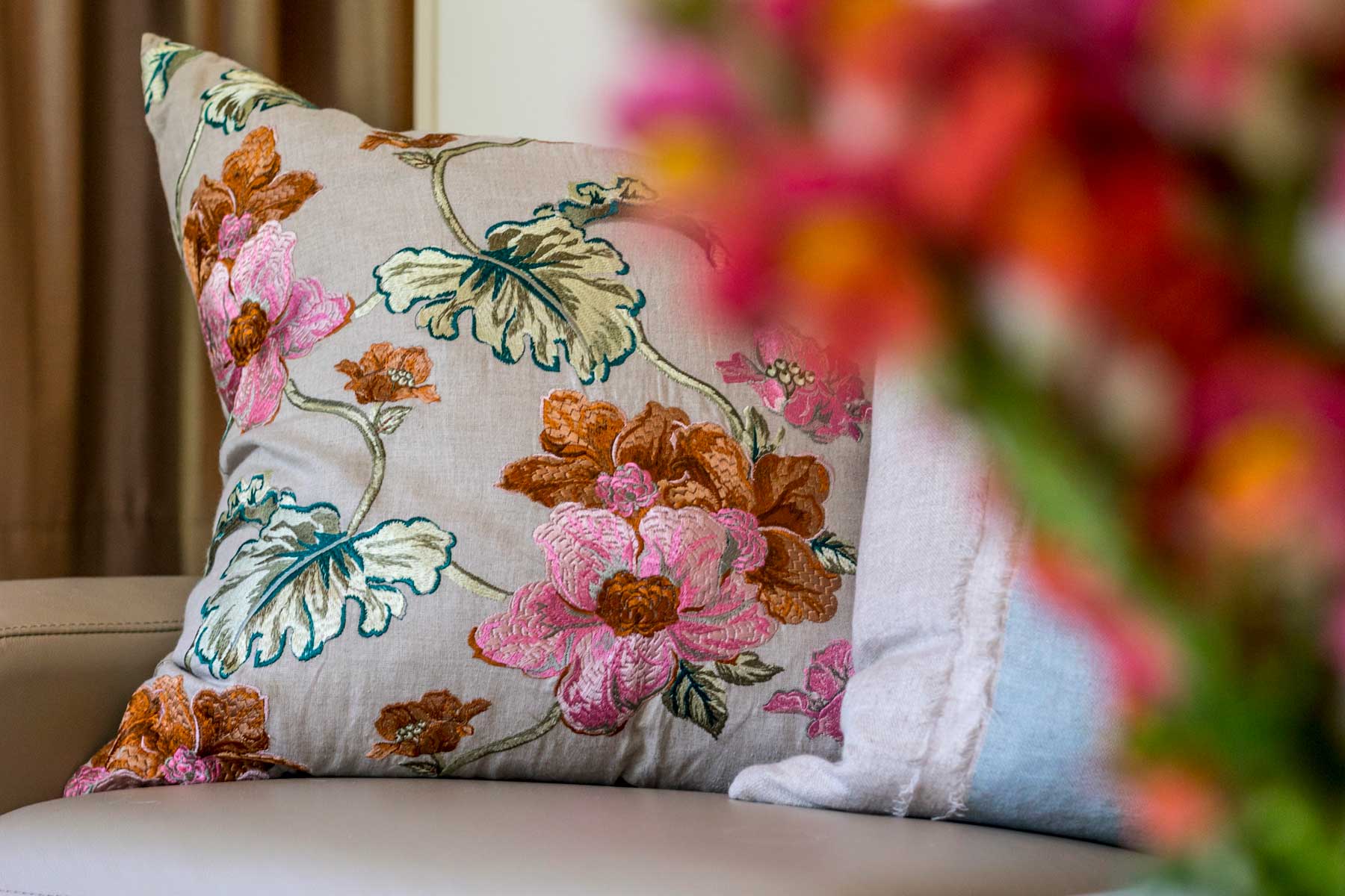 Robyn's vibrant beach apartment - after - cushion floral