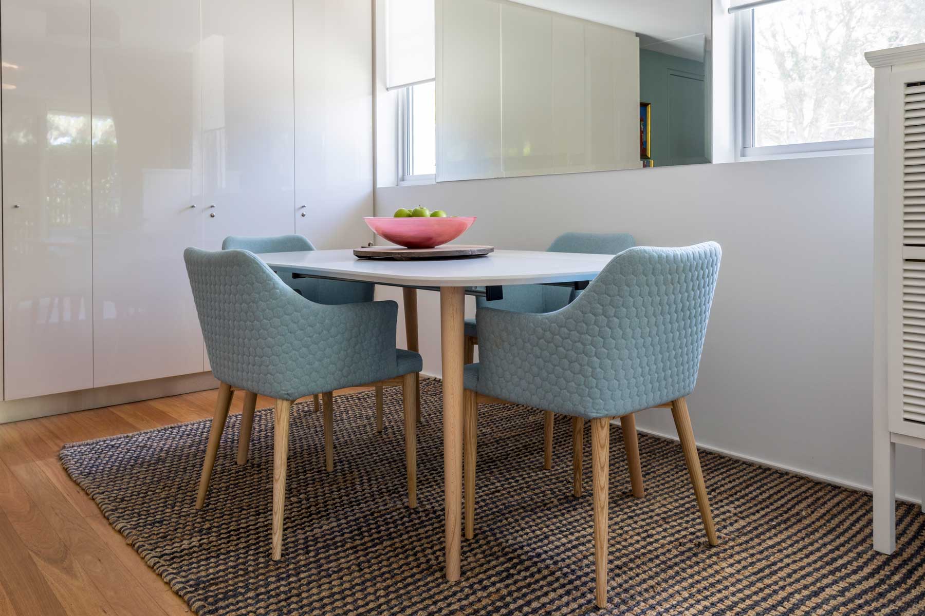 Robyn's vibrant beach apartment - after - dining table