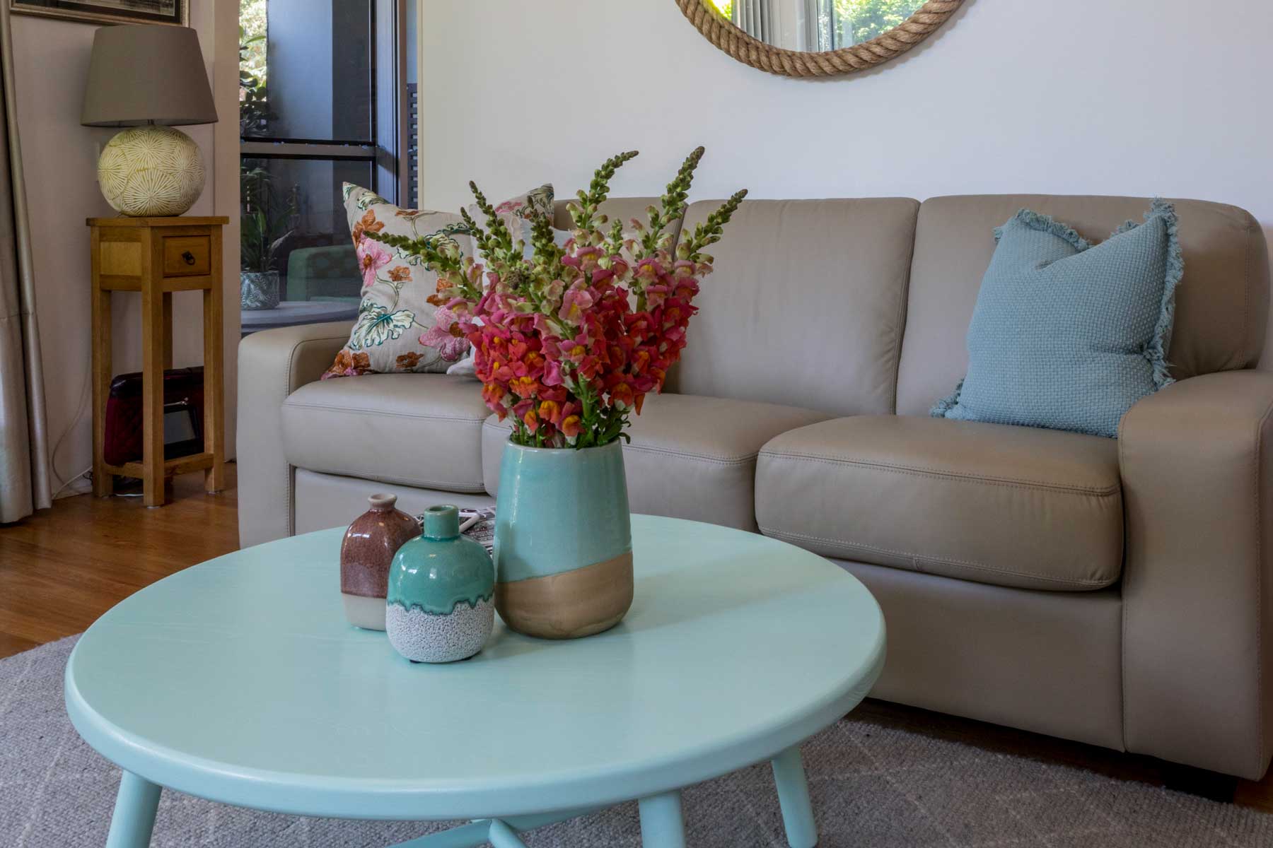 Robyn's vibrant beach apartment - after - lounge floral 2