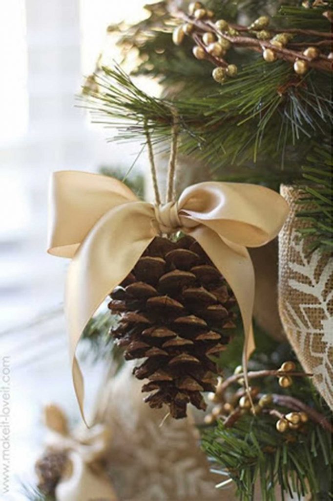 Christmas tree decorating pine cone ornament