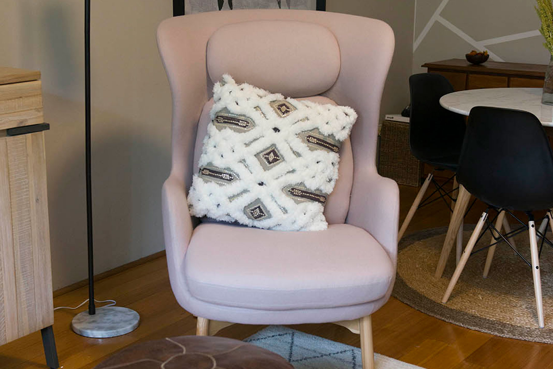 dusty pink arm chair tribal cushion